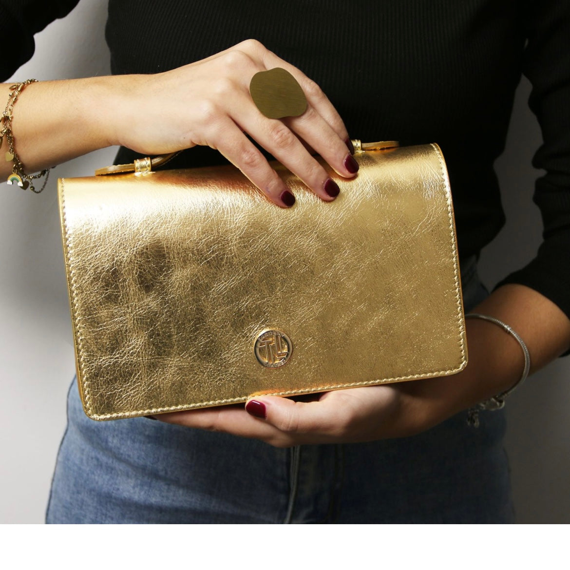 The Tropical Duchess Tuscany Leather Metallic Leather Clutch with Chain Strap OPERA TL142519 in Gold