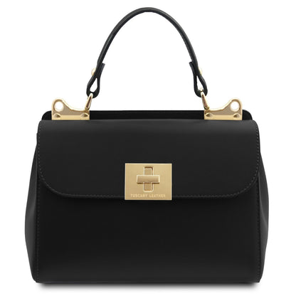 Black handbag with gold accents on a white background