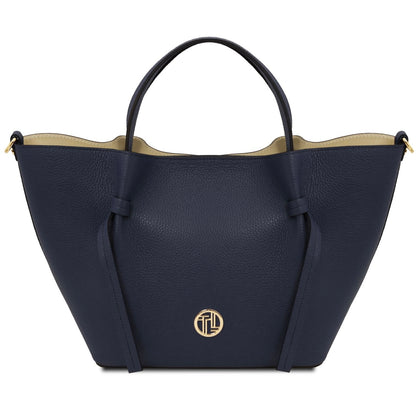 Navy blue handbag with a gold logo on a white background