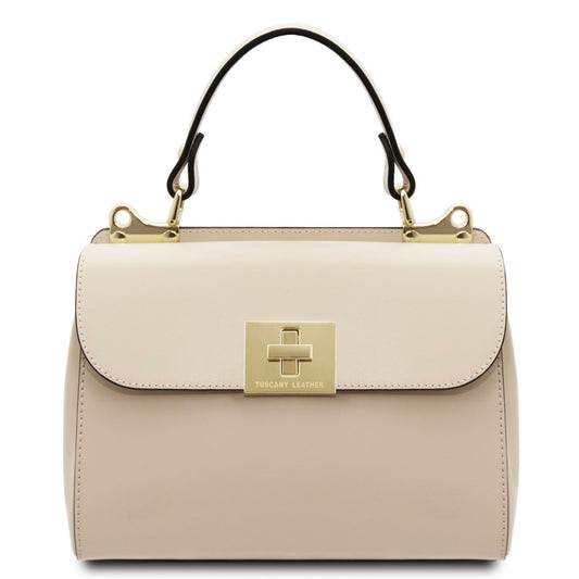 Beige handbag with gold accents on a white background